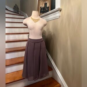 Fully lined lightweight skirt that’s slightly flared.